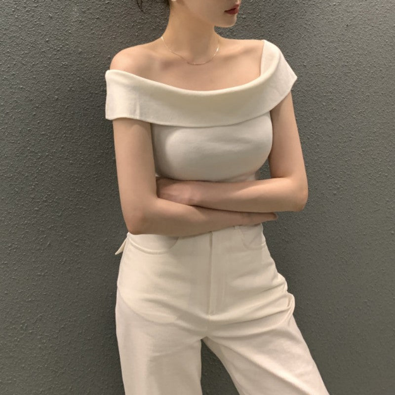 Haut pull rayé à manches courtes pour femme.