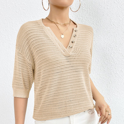Tricot  ajourée en coton à col en V .
