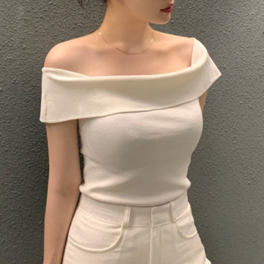 Haut pull rayé à manches courtes pour femme.