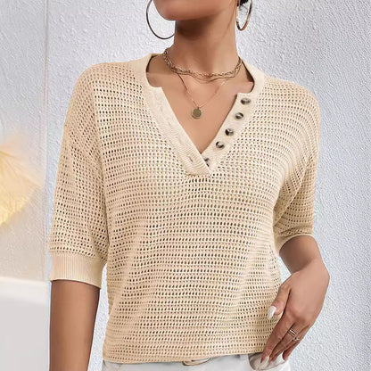Tricot  ajourée en coton à col en V .