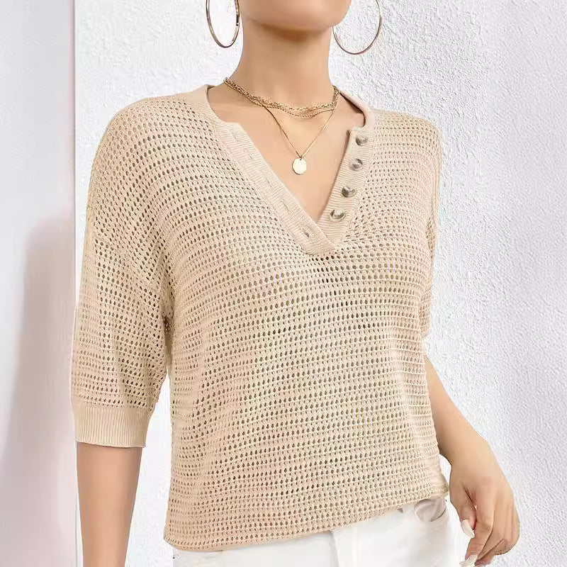Tricot  ajourée en coton à col en V .