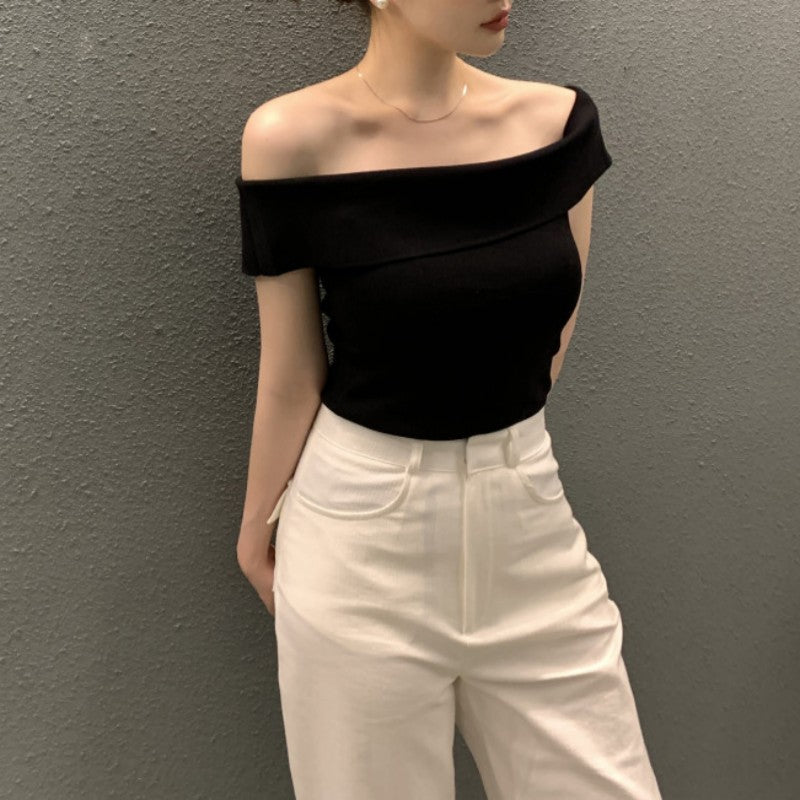 Haut pull rayé à manches courtes pour femme.