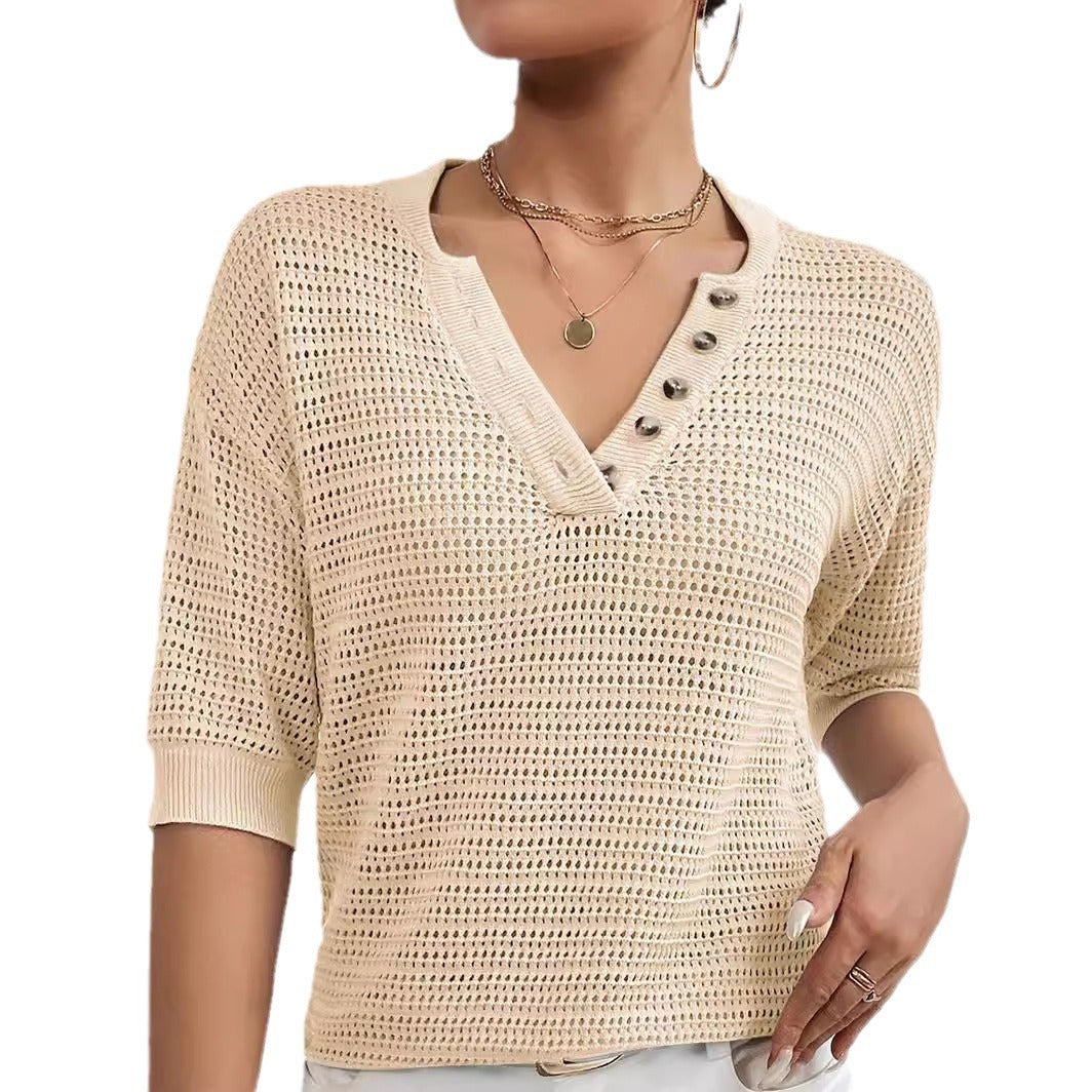 Tricot  ajourée en coton à col en V .